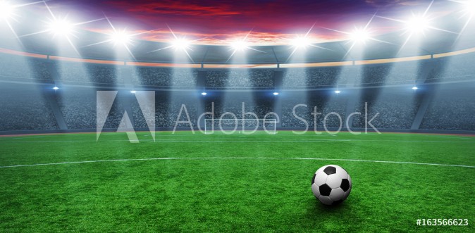 Picture of Soccer ball on green stadium